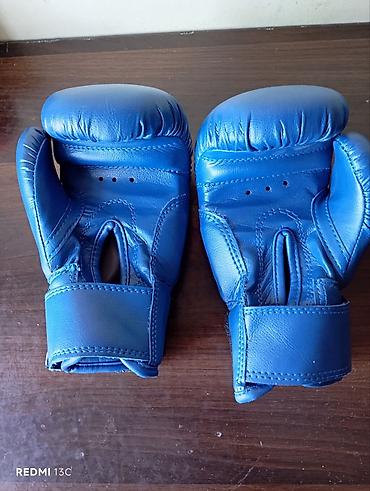 İdman və istirahət: Orijinal Adidas uşaq boks əlcəkləri satılır. Ölçüsü 4 oz (4-6 yaş — 3