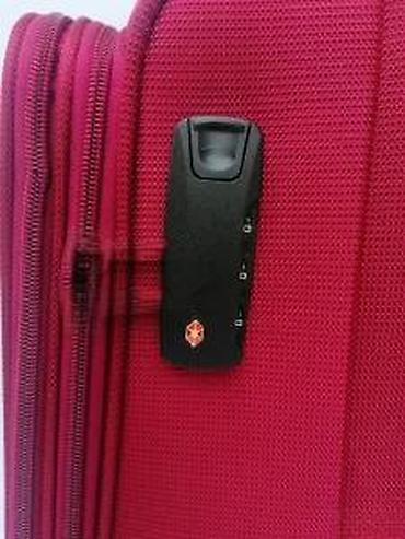 Putni koferi i torbe: Veliki putni kofer na točkiće – tekstilni, crvene boje - Prostrana — 16