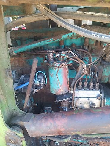 Kommersiya nəqliyyat vasitələri: Ekskavator-yükləyici traktor - Ön hissədə iri yükləmə kovası, arxa — 4