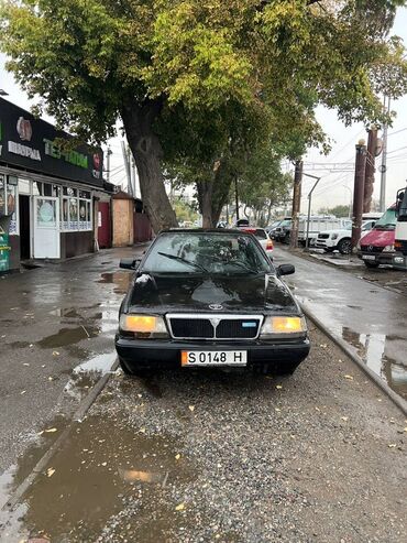 срочно срочно продам машину: Alfa Lancia седан, черный цвет, правый руль. Кузов типичный для