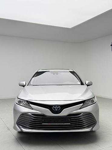byd e2 2025: Toyota Camry: 2017 г., Гибрид, Седан — 3