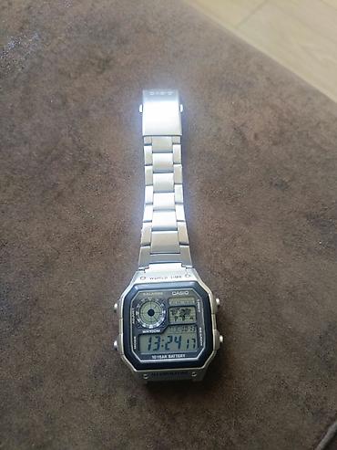 michael kors saat: Casio World Time kişi saatı – metal qolbaqlı, rəqəmsal ekranlı — 2