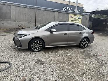 06: Toyota Corolla: 2020 г., 1.8 л, Гибрид, Седан — 5