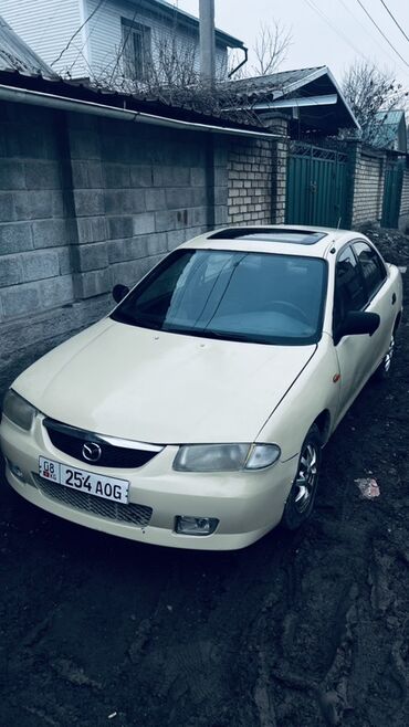 Mazda: Mazda 323: 1995 г., 1.6 л, Автомат, Бензин, Седан — 11