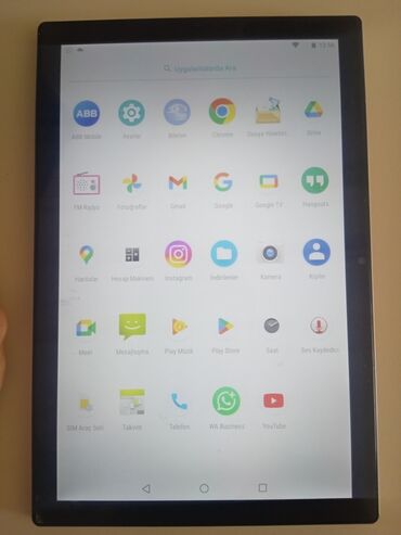 en ucuz lenovo: Android əməliyyat sistemi ilə işləyən gümüşü rəngli planşet. Onun
