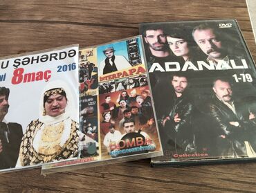 Qazanlar: Müxtəlif janrlarda filmləri ehtiva edən DVD diskləri kolleksiyası