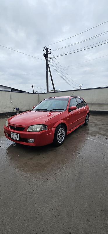 Mazda: Mazda Familia: 2001 г., 2 л, Автомат, Бензин, Универсал — 4