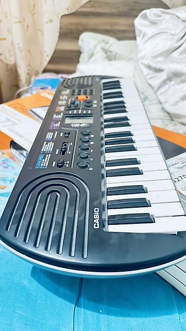 Синтезаторы: Синтезатор Casio SA‑77 (мини-клавиши) - 44 мини‑клавиши - Встроенный — 2