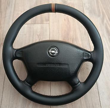 sükan rul: Opel sükan çarxı – airbag bölməsi ilə - Opel loqolu mərkəz hissə — 1