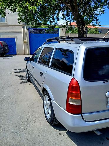 opel astra xectbek: Opel Astra Caravan (Universal) – gümüşü rəng Xüsusiyyətlər: - Kuzov — 8