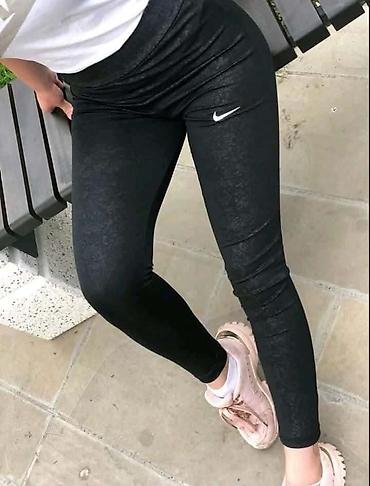 helanke sorc: Helanke NIKE reljefne crne boja sa visokim strukom. Mokra likra — 1