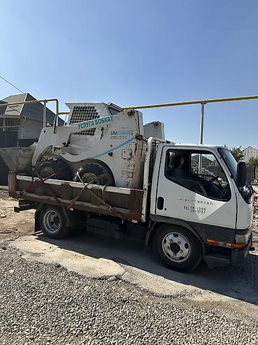 Услуги мини-погрузчика (бобкат) - Мини-погрузчик UniCarrier SSL 701 -