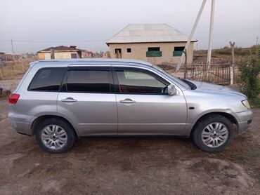 ист колпаки: Mitsubishi Outlander: 2001 г., 2.4 л, Кроссовер