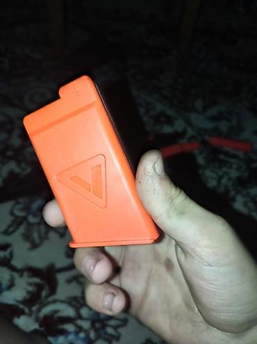 oyuncaqlar: Oyuncaq blaster – qara-narıncı rəng sxemi ilə Xüsusiyyətlər: - — 3