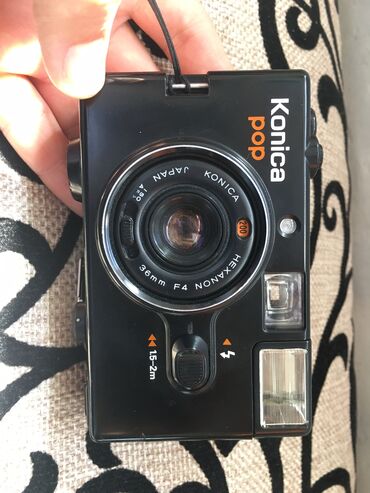 фотоаппарат плёночный: Продается плёночная камера Konica pop. В отличном состоянии, вспышка