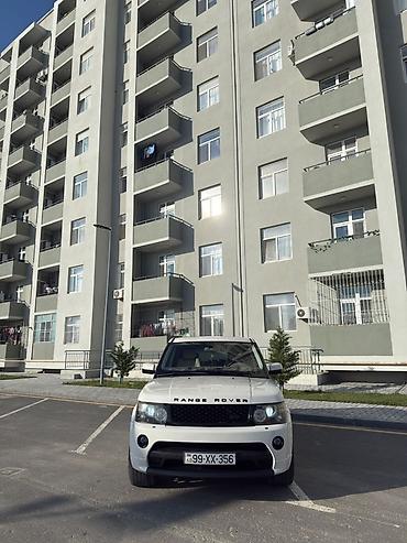 Land Rover: Range Rover Sport – ağ rəngdə, 5 qapılı SUV. Əsas xüsusiyyətlər: - — 4