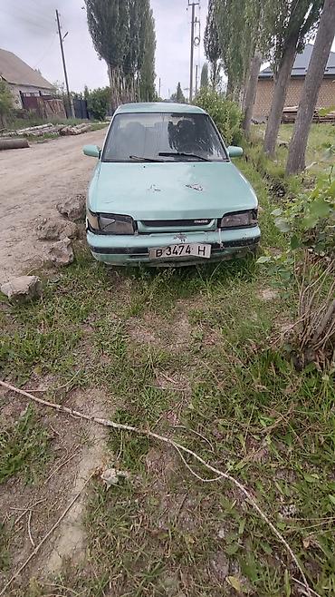 neta ls: Mazda 323: 1989 г., Седан — 1