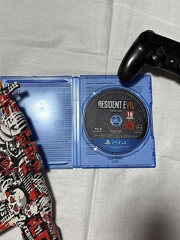 PS4 (Sony Playstation 4): Ps4 Oyunları Resident Evil Biohazard- 40 Azn Uncharted 4- 30 Azn — 3