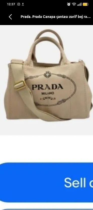 Çantalar: Prada Canapa çantası zərif bej rəngdə təqdim olunur. Modelin ön — 1