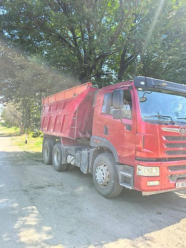 дойки ко: Самосвал FAW (6x4) Описание: - Трехосный самосвал с — 3