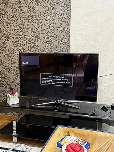 tesla tv: Samsung LED televizor, diaqonal təxminən 46–50”. Qara, nazik çərçivəli — 1