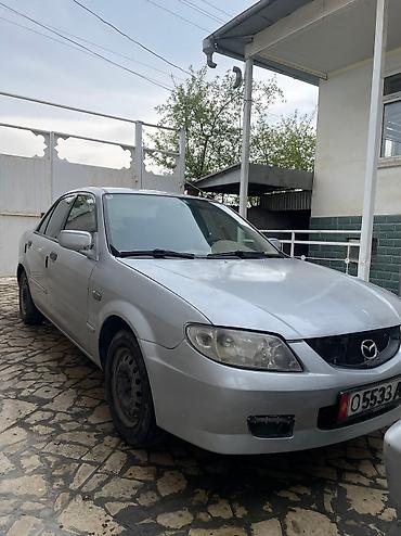 аренда mazda 323: Mazda 323: 2003 г., 1.4 л, Механика, Бензин, Седан — 2