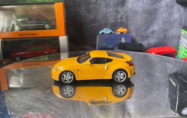 Avtomobil modelləri: Коллекционная модель Nissan 370Z Z34 yellow 2008 DeAgostini Scale — 2