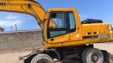 Экскаваторы: Экскаватор, Hyundai, 2004 г., Колесный — 2