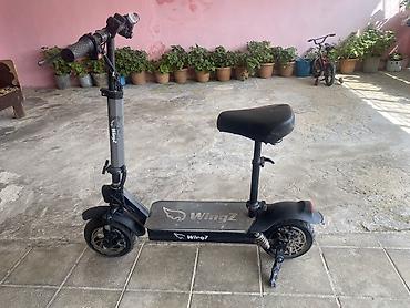 Электротранспорт: Elektrik skuter – Wingz markası, oturacaqlı model pultla ise salma — 4