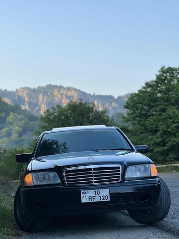 opel astra c: Mercedes-Benz 220: 2.2 l | 1996 il Sedan