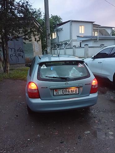 mers e210: Mazda 323: 2002 г., Механика, Хэтчбэк — 4