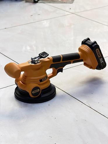 Digər alətlər: DERA firmasının 21V akkumulyatorlu kafel vibratoru həm vibrasiya, həm — 2
