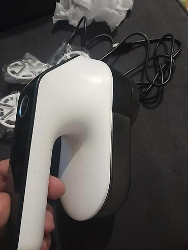 Ostali kućni aparati: Električni aparat za uklanjanje mucica i dlačica sa odeće (lint — 5