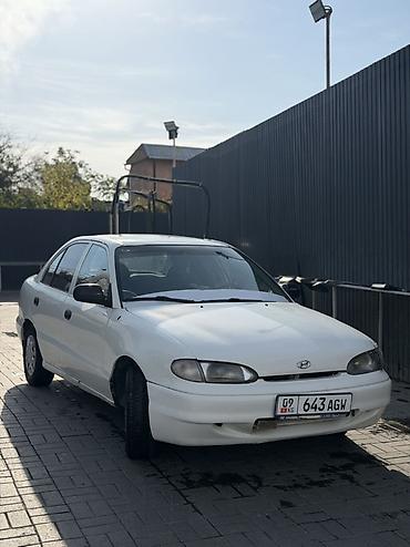 shevrolet lacetti: Sedan компакт-класса, 4 двери, белый цвет. Киргизские номера (KG) — 8