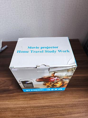 Proyektorlar: Portativ Proyektor – BT 5.0 & Wi‑Fi Əsas xüsusiyyətlər: - Ev — 1