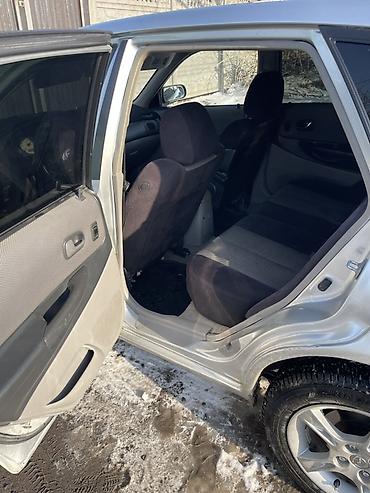 Mazda: Mazda 323: 2003 г., 1.6 л, Бензин, Универсал — 17