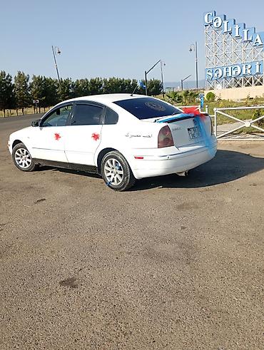 volkswagen polo v: Volkswagen Passat (B5) sedan – ağ rəngli, 4 qapı, önlü-arxalı geniş — 4