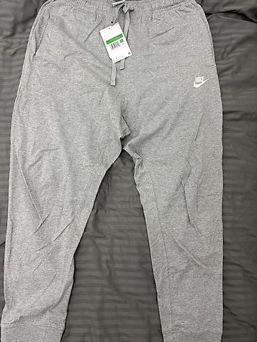 nike штаны: Оригинал!Серые спортивные штаны Nike - Модель: джоггеры с манжетами — 1
