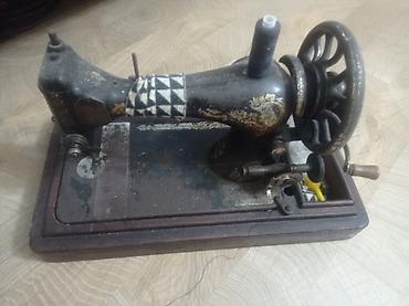 Antik mexaniki tikiş maşını - Klassik əl fırladıcı volantlı model -
