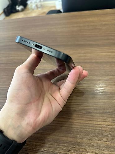 internet data: IPhone 16e, 128 GB, Qara, Simsiz şarj, Face ID — 3