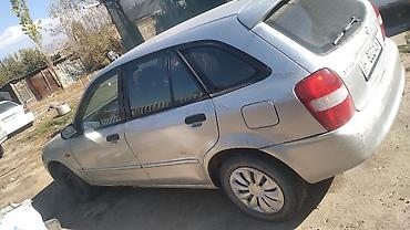 sliv mereke: Mazda 323: 2001 г., 1.6 л, Механика, Бензин, Универсал — 1