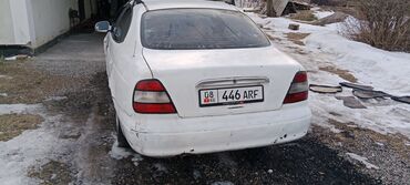 автомобиль bmw: Dacia : 1999 г., 2 л, Механика, Бензин, Седан