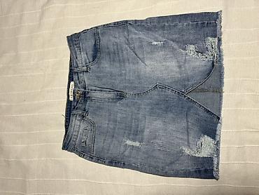 Ženska odeća: Ženska teksas suknja – mini dužina, svetliji plavi “washed” denim — 1