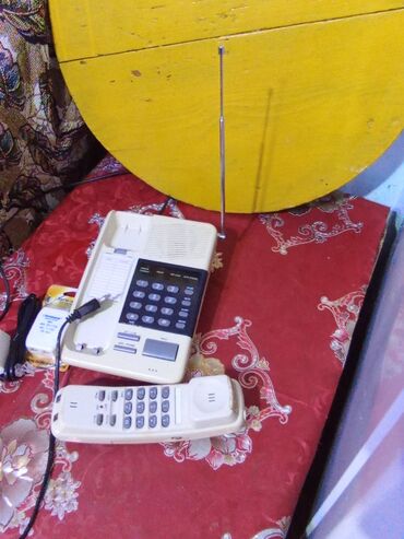 Stasionar telefonlar: Telefon aparatı 
ratsiya ilə və sadə knpkaoi
əmircanda