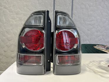 купить задний фонарь: Комплект стоп-сигналов Mitsubishi Новый, Аналог