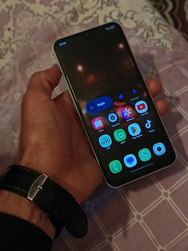Мобильные телефоны: Samsung Galaxy A15, 128 ГБ, цвет - Белый, Отпечаток пальца — 3
