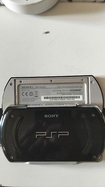 plastation klub: Psp Go ideal vəziyyətdə, original reklamı var,11 oyun var: Agent 007 — 2