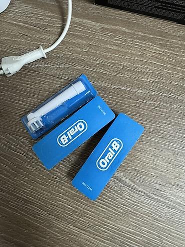 diş fırçası: Oral-B Braun elektrik diş fırçası (mavi-ağ rəng). Ustunde hediye dis — 4