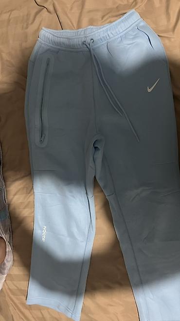 часы coros: Спортивные брюки Nike NOCTA - Цвет: светло‑голубой (ice blue) - — 1