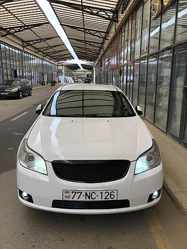 kia sorento oluxana: Chevrolet Epica sedan – ağ rəngdə, 5 yerlik, ön‑ötürücülü. Geniş salon — 1